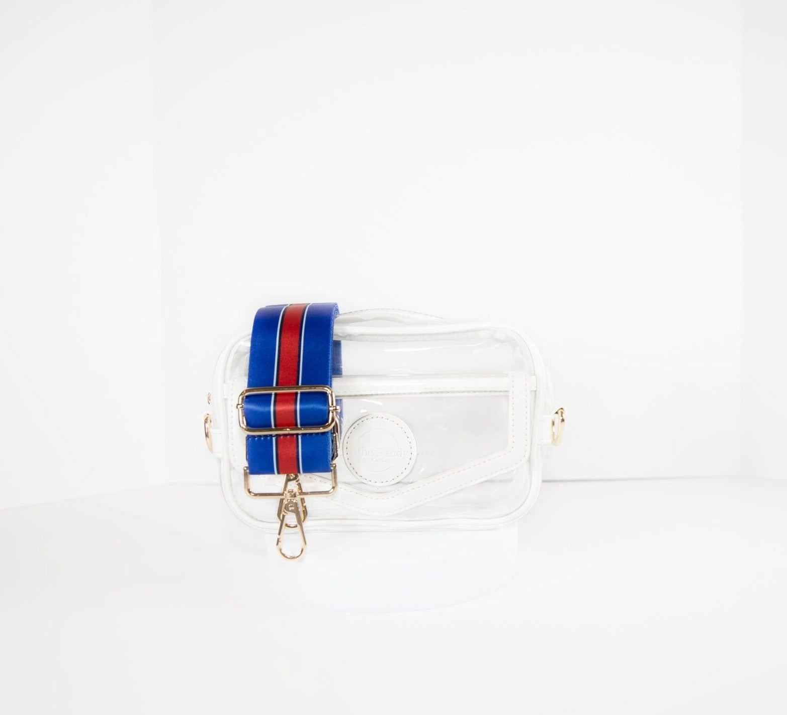 Clear stadium bag with white leather trim, front facing, with a crossbody strap in Buffalo Bills colors.