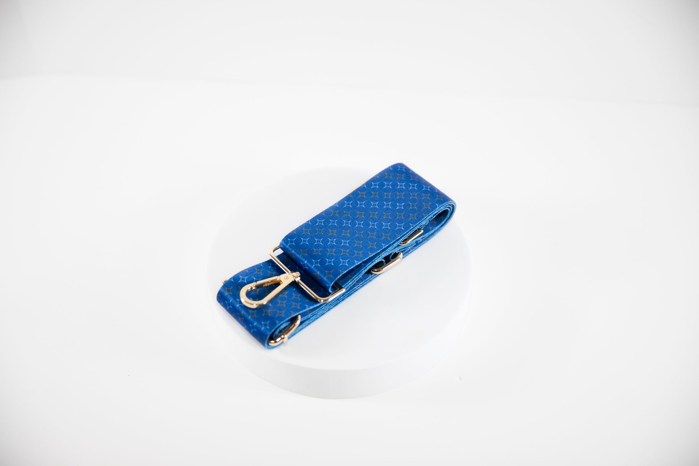 Elegant Crossbody strap shown in NY Mets team colors of blue, orange and white.