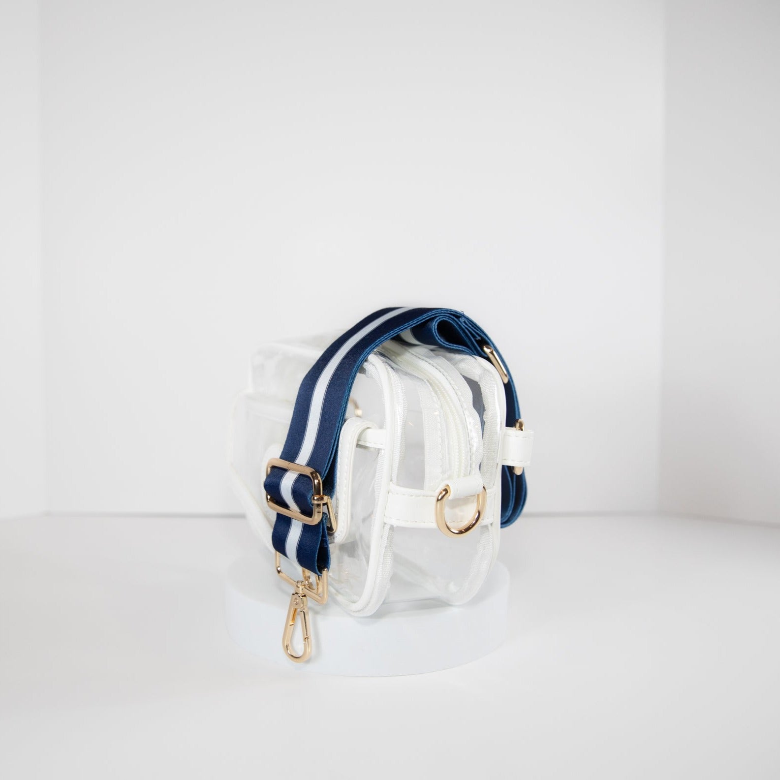 Clear stadium bag in white trim, side facing, with a crossbody strap in Penn State Nittany Lion colors.