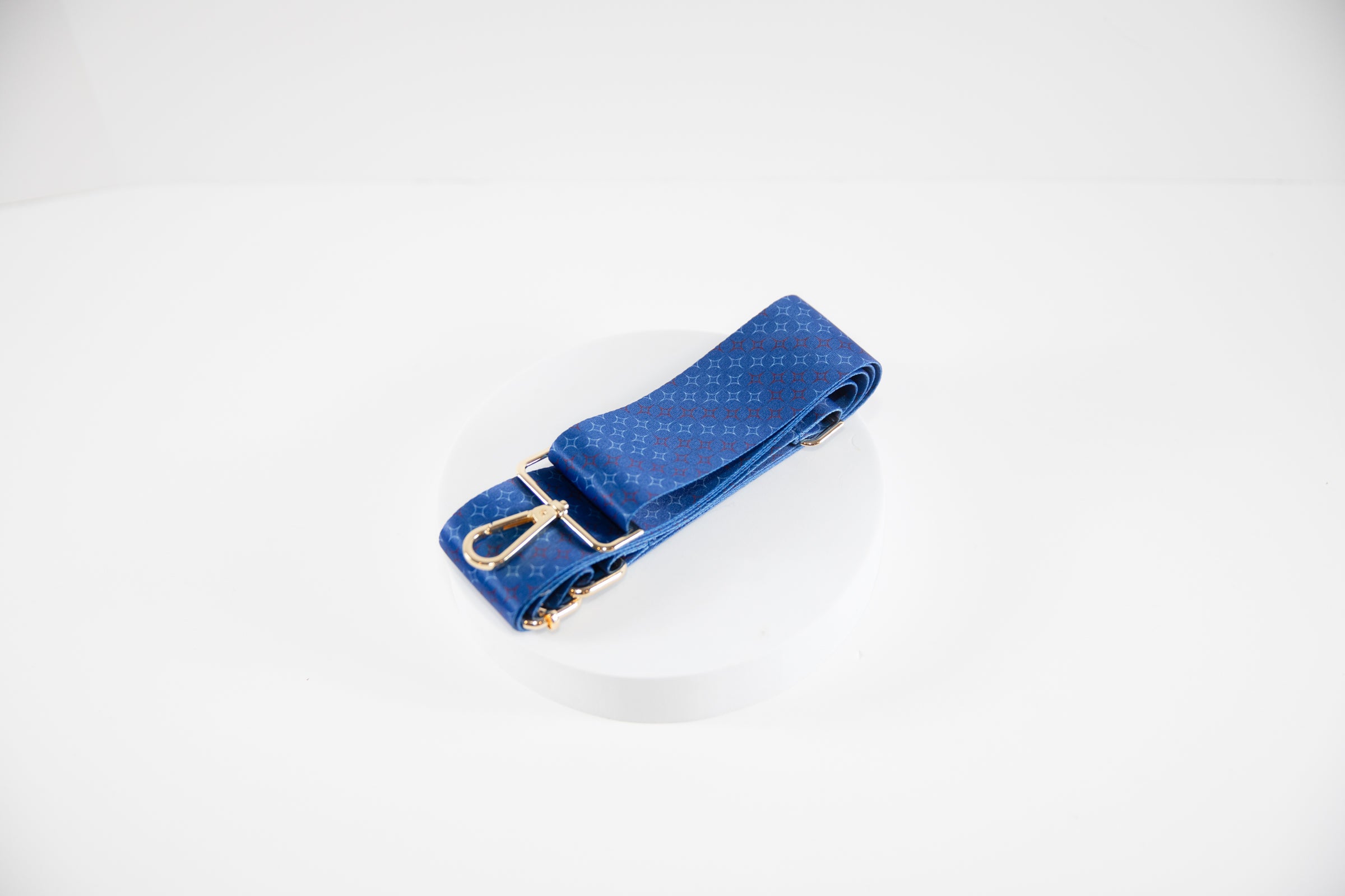 Elegant cross body strap shown in Texas Rangers team colors of red, white and blue.