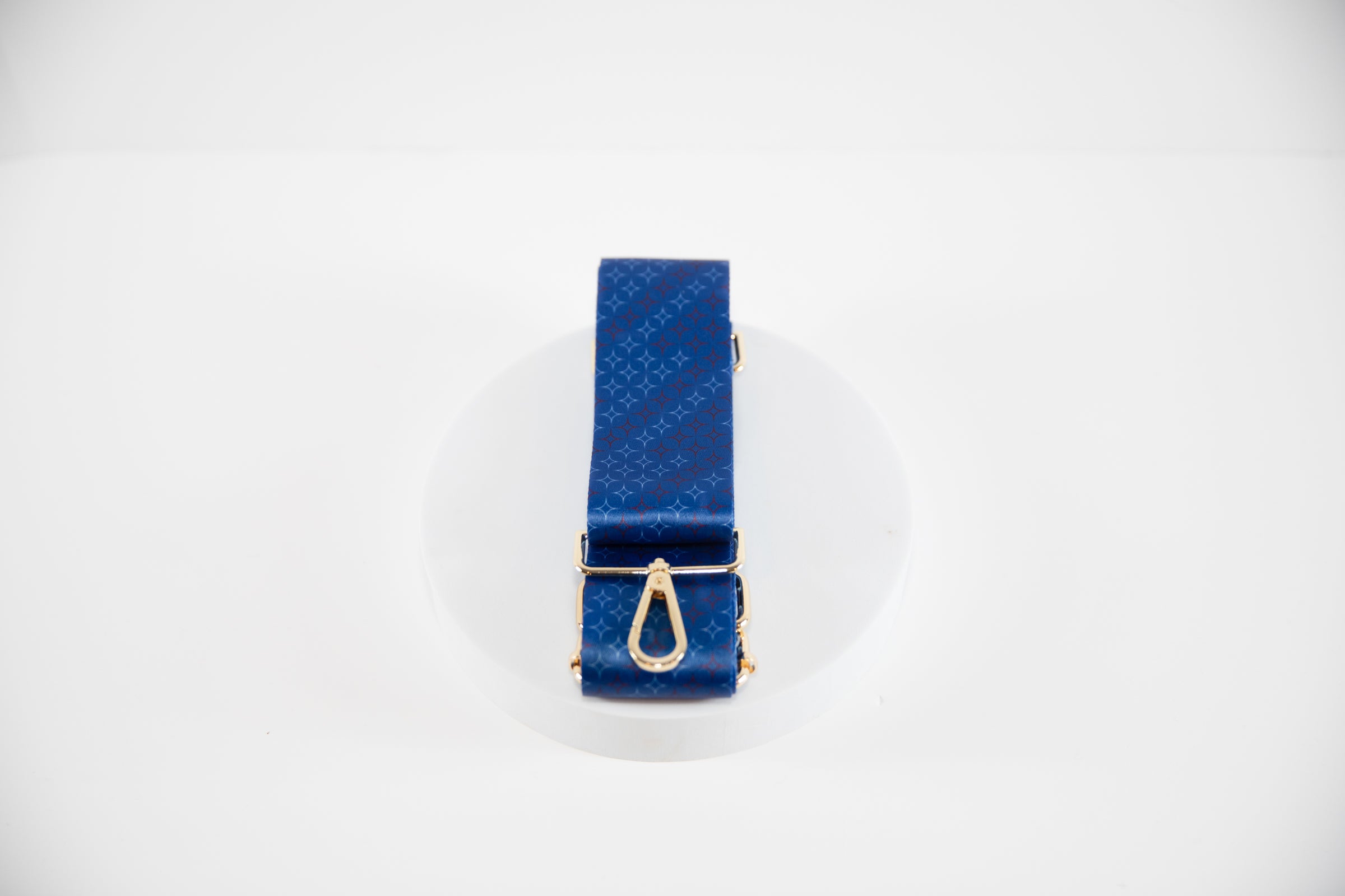 Elegant cross body strap shown in Texas Rangers team colors of red, white and blue.